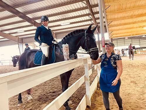 Sonesta Farms Gina on client horse at show